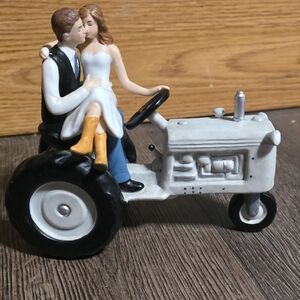Charming Couple on Tractor Figurine